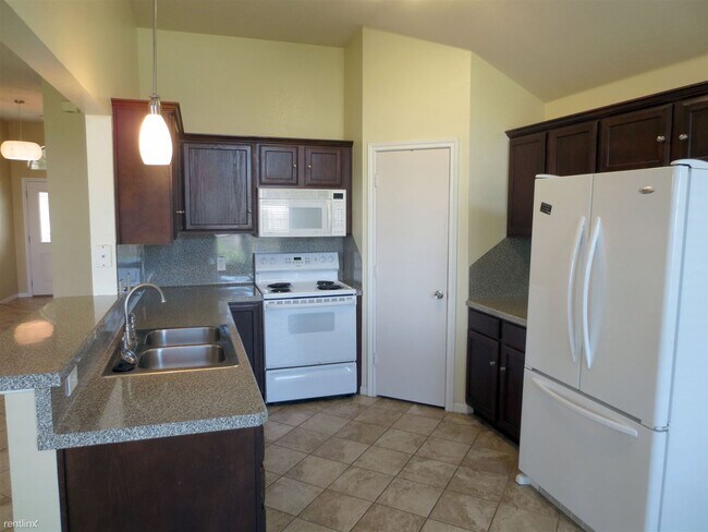 Building Photo - 3 br, 2 bath House - 1001 Orchid St