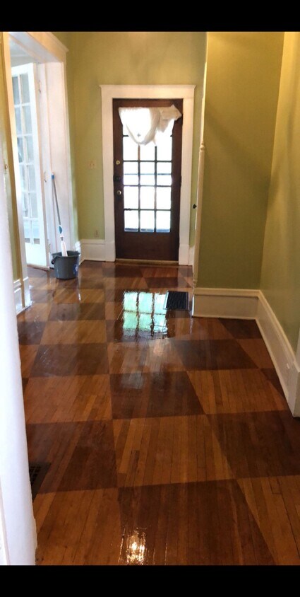 Entry hallway, view from dining room. - 1321 Highland St