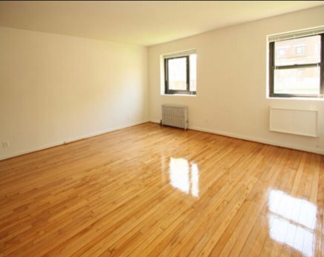 Building Photo - 203-12 42nd Ave