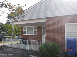 Building Photo - 102 Troumaka St