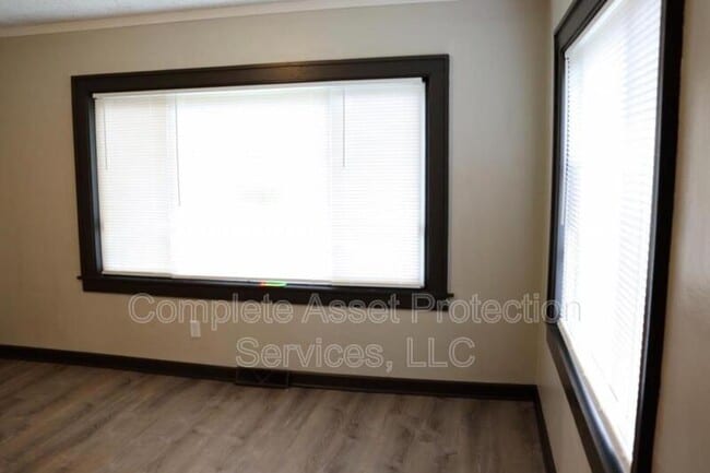 Building Photo - 1649 W 57th Ave