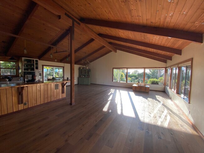 Near-empty living room from front door - 448 Estero Ave