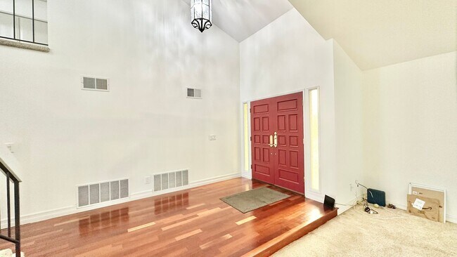 Building Photo - Spacious Two-Story Home with Three-Car Att...