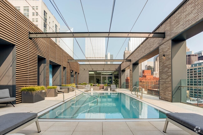 Dive into relaxation—poolside perfection awaits. - Emme