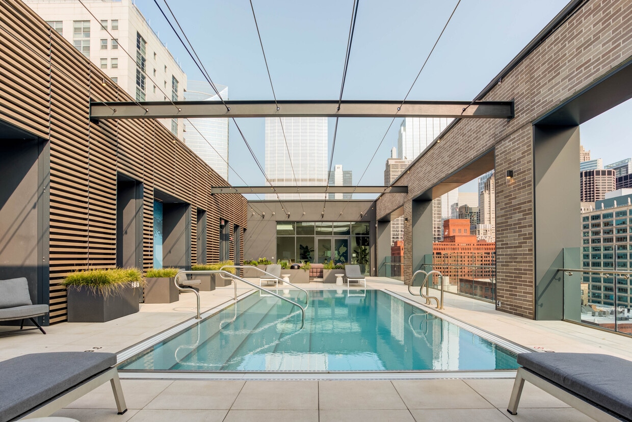 Dive into relaxation—poolside perfection awaits. - Emme