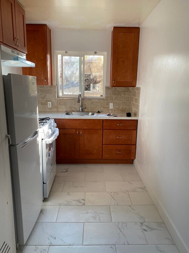 Kitchen - brand new stove - 495 E William St