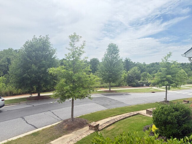 Building Photo - Beautiful Westbranch Home with 2-Car Garage, Covered Porch & Greenway Entrance Across the Street