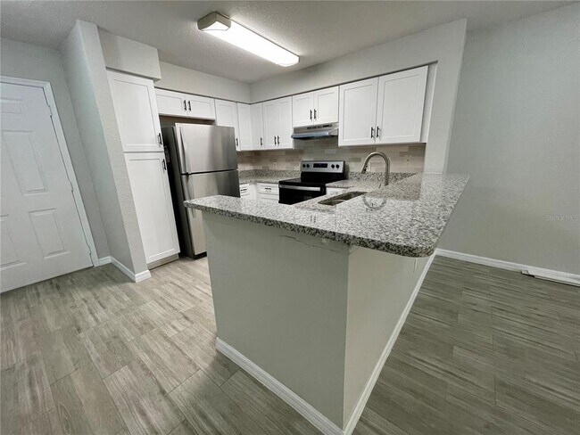 Foto del edificio - 13803 Fairway Island Dr