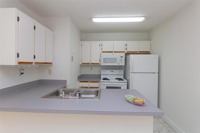 Building Photo - 18304 NW 68th Ave
