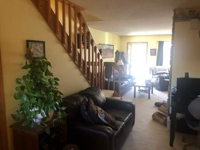 Dining area looking to front door - 8185 S Fillmore Cir Townhome