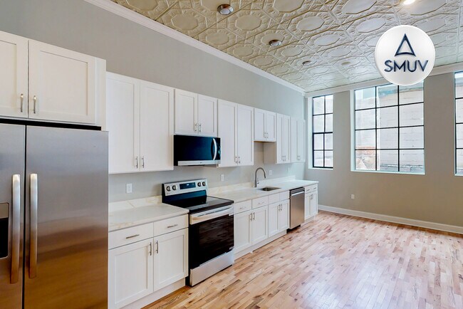 Building Photo - 100 West Lexington-209