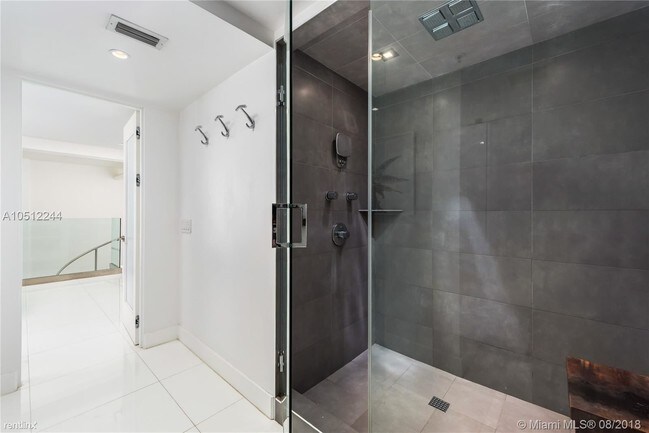 Building Photo - 1 br, 1.5 bath Condo - 7744 Collins Ave Apt 8