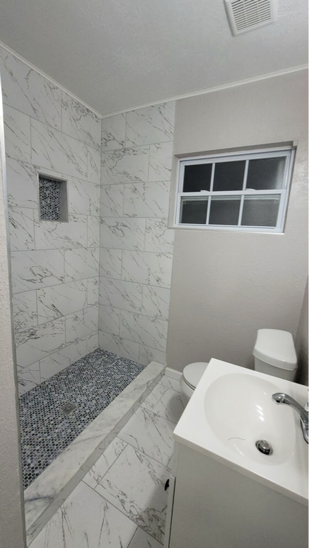 Building Photo - 7115 N Tampania Ave