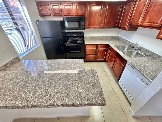 Building Photo - ADORABLE 2 BEDROOM 2 BATHROOM 1ST FLOOR CONDO
