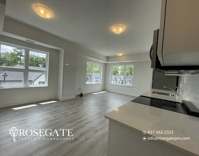 Photo du bâtiment - Corner 1+Den Condo with Private Balcony & Parking in Kitchener