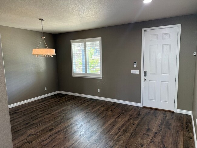 Photo - Greenbelt-Backed Wheatlands Home - Mountain Views, 3 Car Garage & Finished Basement