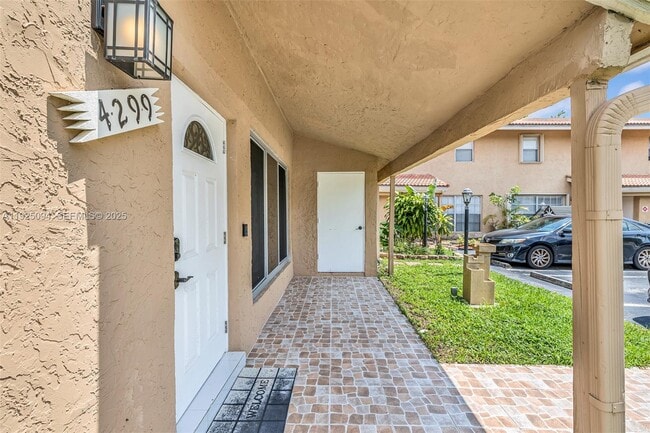 Building Photo - 4299 Coral Springs Dr