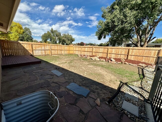 Photo - Charming 2-Bedroom Basement Unit with Private Yard – Flat-Rate Utilities! Apartment
