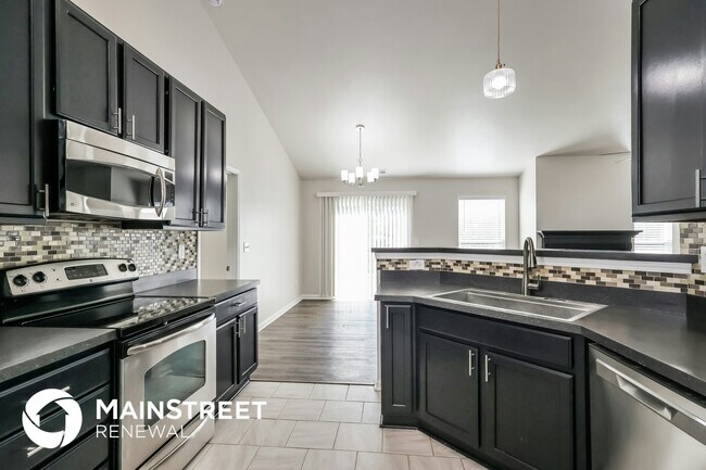 Foto del edificio - 7003 Hollow Oaks Dr