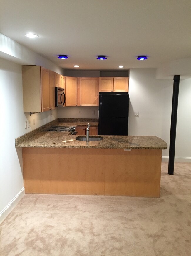 kitchen with seating space at counter - 1763 Church St NW