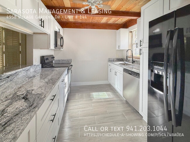 Foto del edificio - 4958 Village Garden Dr