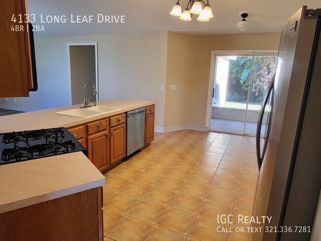 Building Photo - Large - Beautiful 4/2 in a quiet neighborh...