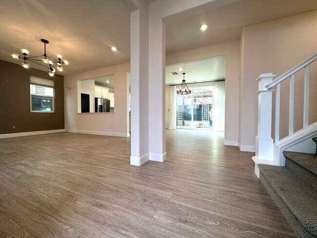 Building Photo - Beautifully Upgraded Home with Downstairs Bedroom & Open Floor Plan