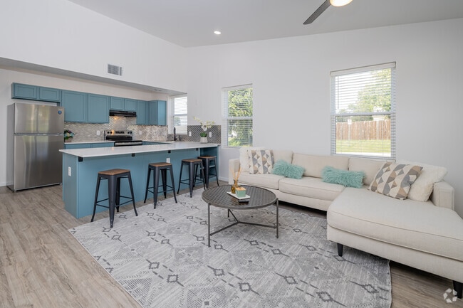 Common Area - Furnished Kitchen And Living Room - 1100-1110 E Hurd St Apartments