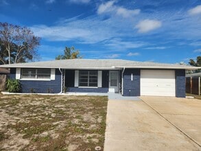 Building Photo - 8007 Portage Dr