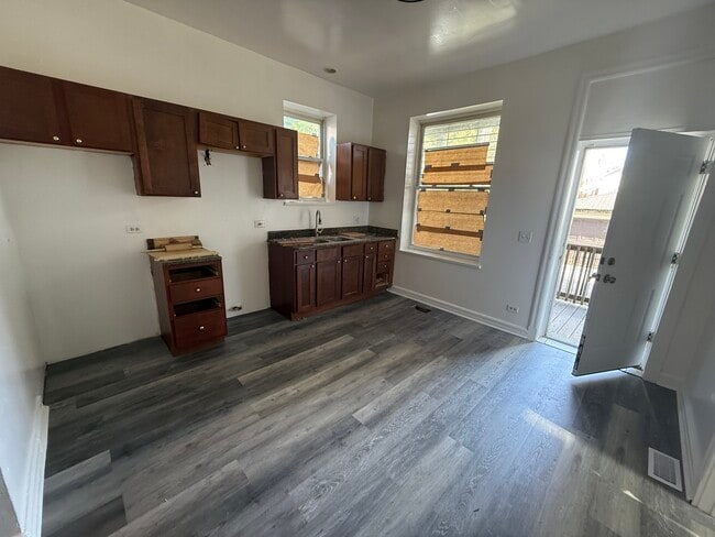 Building Photo - 1239 S Spaulding Ave