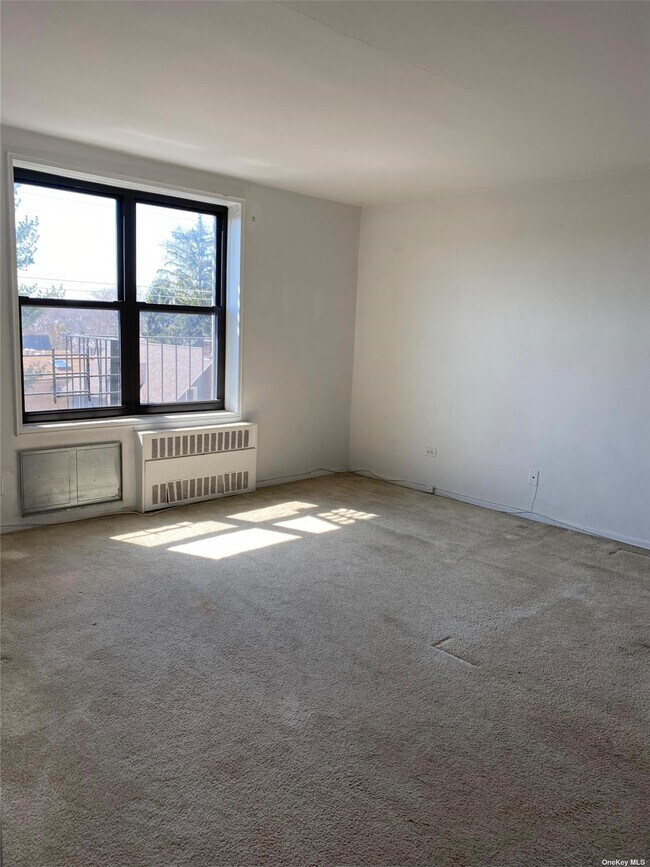 Building Photo - 209-10-209-41 41st Ave