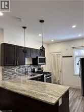 Building Photo - 1152 King St E