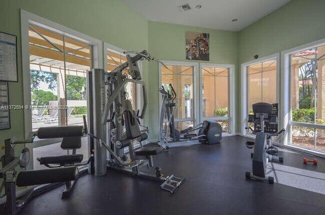 Building Photo - 4887 Via Palm Lakes Via