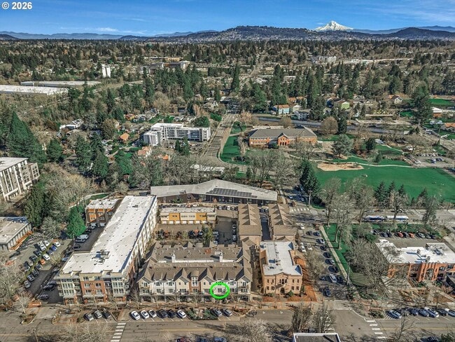 Building Photo - Main Street Living with Granite Kitchen, Gas Fireplace, and MAX Line Access