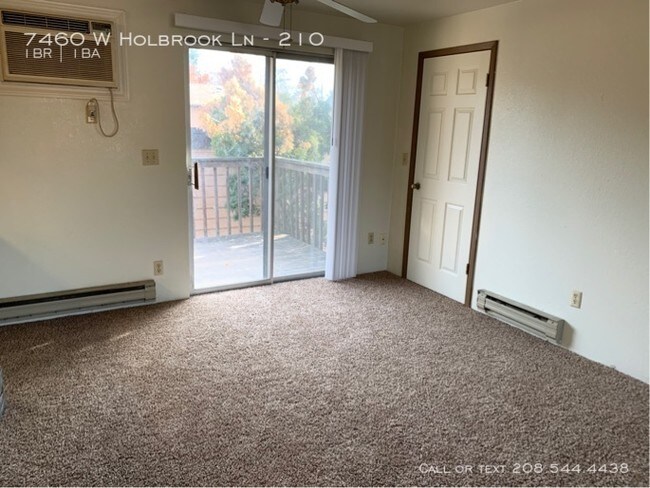 Building Photo - 7460 W Holbrook Ln #210