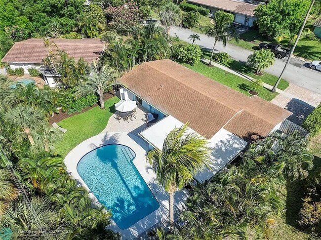 Building Photo - Tropical Oasis Home in THE COVE! ONE MILE ...