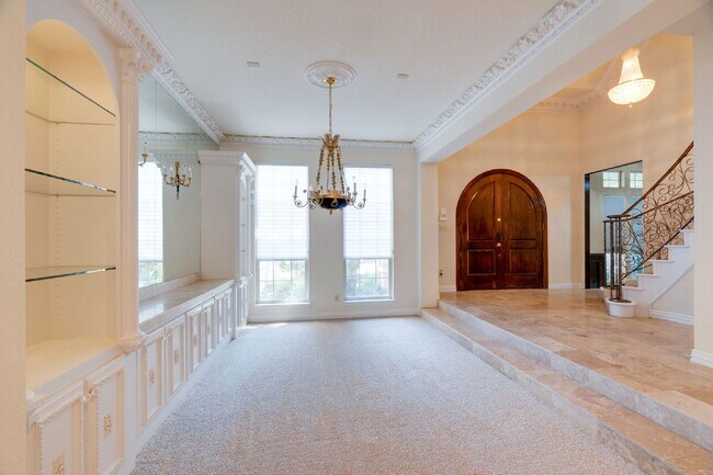 Building Photo - "Stately Gated 5-Bedroom Estate With Pool, Custom Details & Abundant Living Space!"