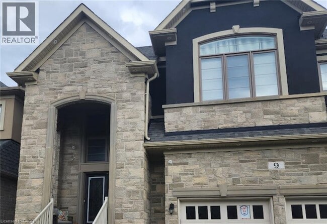 Photo du bâtiment - 9 Rolling Rock Way