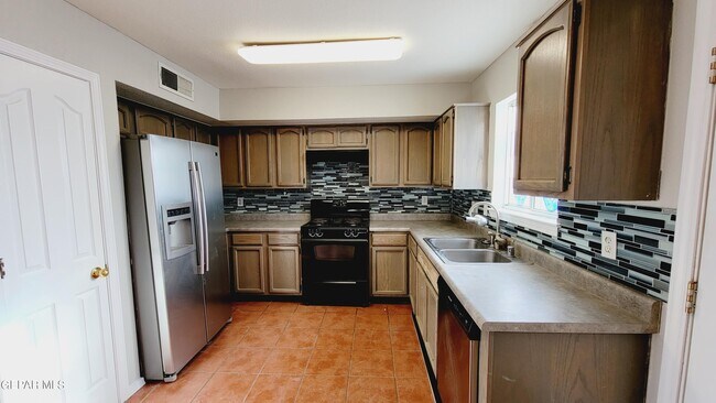 Building Photo - 6217 Rose Colleng Pl