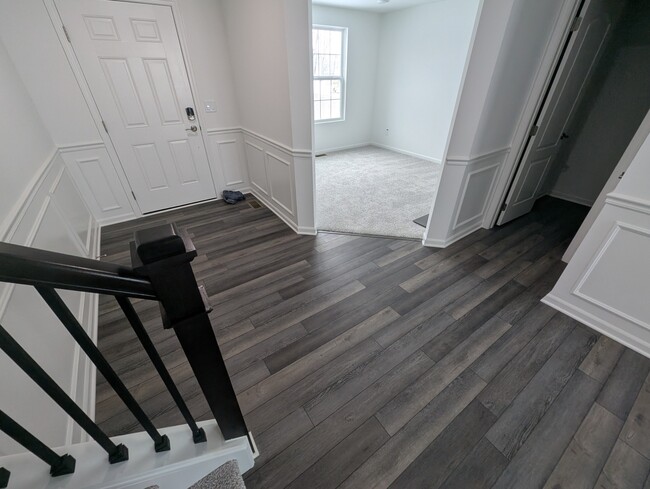 Entryway view of front entrance and first floor study room - 9257 Hemlock Ln