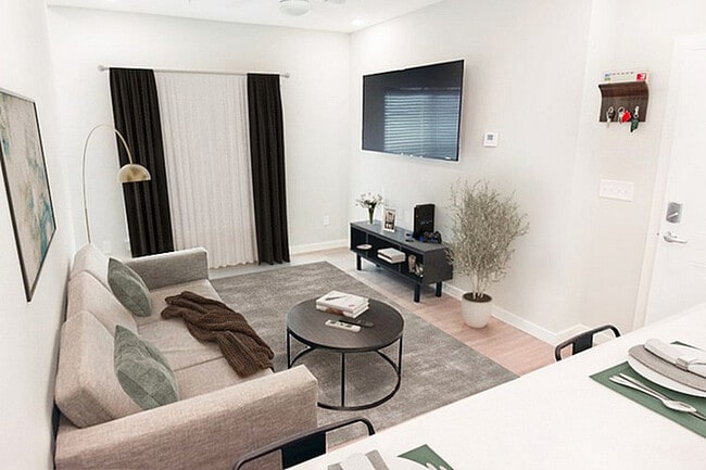 Sala de estar de casa adosada de 1x1 - College Vue on University