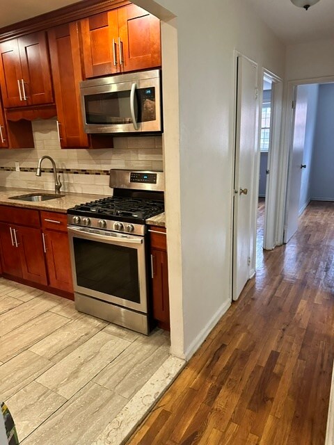 New Stove - 648 E 82nd St