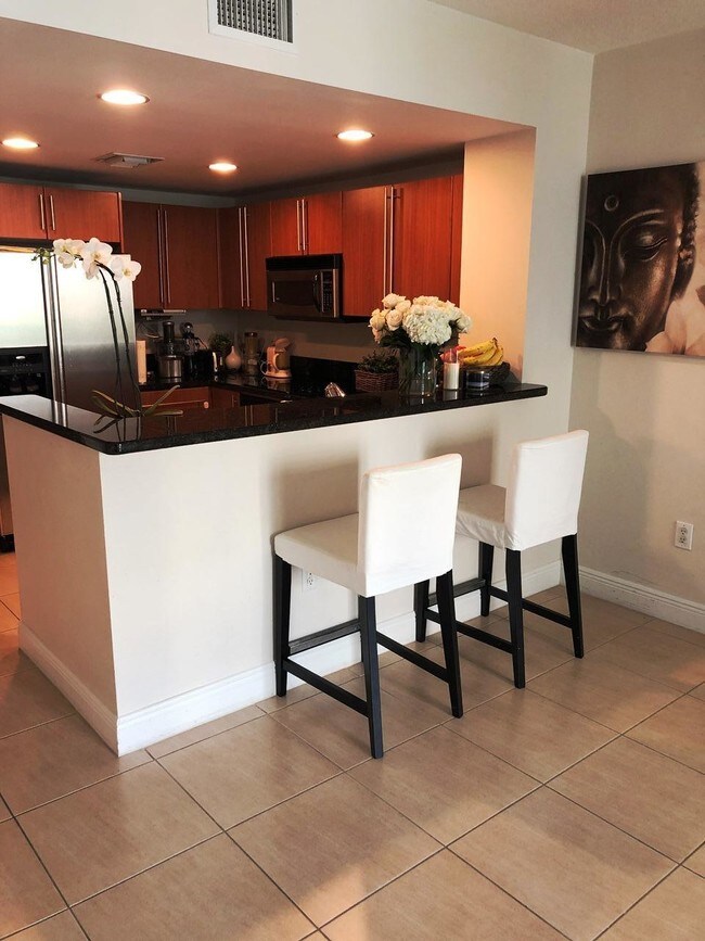 Building Photo - 610  Clematis Street 423