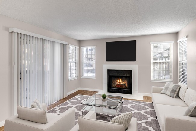 Living room fireplace at Arcadia Apartment Homes in Centennial, CO - Arcadia Apartment Homes