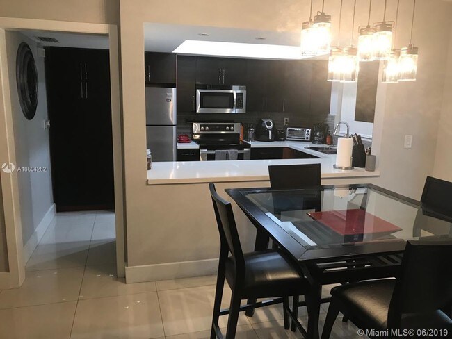 Building Photo - 7449 Twin Sabal Dr