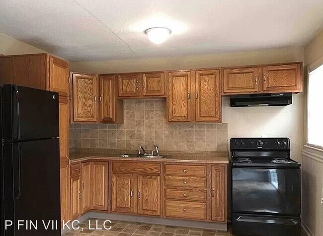 Building Photo - 4 br, 1 bath House - 7521 Olive St