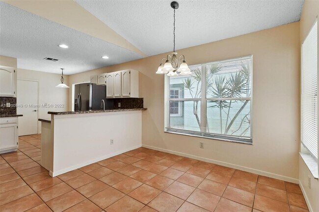 Building Photo - 8850 Lake Park Cir N