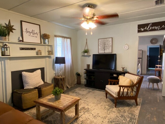 Building Photo - Partially Furnished Charming 4 Bedroom hom...