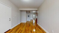 Located at 255 Ellsworth Ave in New Haven, CT, this single-floor, three-bedroom, one-bathroom home offers a well-organized layout with consistent hardwood flooring flowing throughout every room, lending warmth and cohesion to the entire space. The living and dining areas are open and airy, with neutral gray walls and clean white trim that create a bright, welcoming atmosphere. Natural light filters through multiple windows, enhancing the richness of the polished wood floors. The kitchen is a standout feature, boasting rich warm-toned cabinetry, dark countertops, a mosaic tile backsplash with a blend of slate and earth tones, and stainless steel appliances including a gas range. A window above the countertop brings in additional natural light. The three bedrooms are each comfortably sized with hardwood floors, neutral walls, and windows that overlook the surrounding neighborhood. Three closets provide practical storage throughout the home. The bathroom is finished with tile flooring, a full tub-shower combination, and built-in shelving for added convenience. With its updated finishes, cohesive design, and efficient use of space, this home offers a comfortable and functional living environment in a well-established New Haven neighborhood.