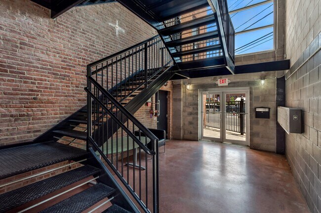 Bldg entry with elevator - 704 GRAND St